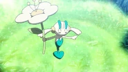 Goh's Floette (Pokemon) using Grassy Terrain.