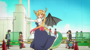 Tohru (Miss Kobayashi's Dragon Maid) manifesting her wings and tail in human form.