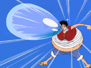 Luffy (One Piece) firing a water bullet at Crocodile.