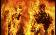 SCP-457 - Burning Man (SCP Foundation) has fire surrounding his entire body.