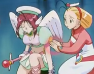 Rescue (Corrector Yui) heals Haruna with energy.