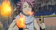 As a Fire Dragon Slayer, Natsu Dragneel (Fairy Tail) can eat fire to replenish his energy.