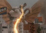 King Ghidorah (Godzilla) breathing out destructive beams of gravitons from his mouths.