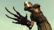 The Lone Wanderer (Fallout 3) wielding a Deathclaw gauntlet