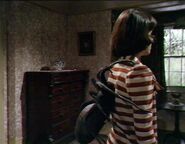 An Eight leg (Doctor Who) possesses Sarah Jane.