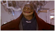 Goombas (Super Mario Bros. 1993 film), former humanoid dinosaurs reduced to an earlier stage of their evolution.