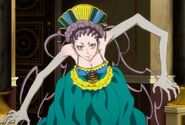 Mine (Karneval) extending her limbs and revealing her monstrous form.