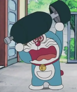 Doraemon (Doraemon) bringing out his "Earth-Destroying Bomb".