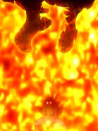 Natsu Dragneel (Fairy Tail) surrounding himself in the fire of his Fire Dragon Slayer Magic.