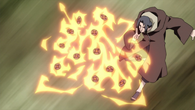 Itachi Uchiha (Naruto) using Fire Release: Phoenix Sage Flower Nail Crimson to imbue shuriken with flames, launching fiery bladed projectiles.