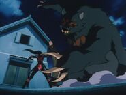 ...and block a strike from a bear yokai several times her size...