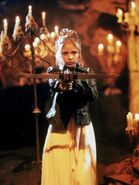 Among Buffy Summers' (Buffy the Vampire Slayer) Slayer powers is the incredible skill with ranged weaponry such as crossbows.