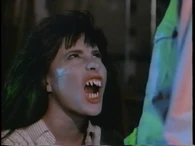 Roxanne with fangs.png (394 KB) The Cartoon Monster (Evil Toons) disguised itself as Roxanne to fool everyone else in the household.