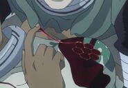 Karako Koshio (Deadman Wonderland) using her Fists of Blood to clot a wound.