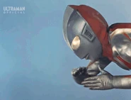 Ultraman (Ultraman) firing Slash Beams.