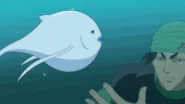 Coco (Toriko) using a Knocking Gun to knock out a Puffer Whale.
