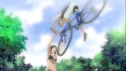 Natsumi Strength.jpg (25 KB) Natsumi Tsujimoto (You're Under Arrest) demonstrates her strength by effortlessly lifting a speeding bike, rider, and all.