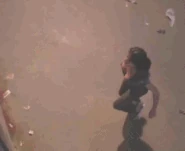 Prue Halliwell (Charmed) walks up a wall.