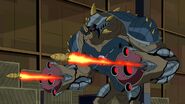 Ultimate Humungousaur (Ben 10) projects kinetically unstable bone fragments from his gun-arms.