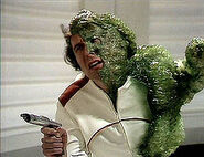 Noah (Doctor Who) being transformed into a wirrn.