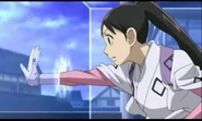 Tokine Yukimura (Kekkaishi) using Spatial Phasing to attune her wavelength to that of the barrier, allowing her to phase through it without disrupting it.