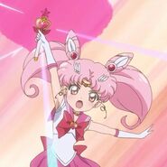 Sailor Chibi-Moon (Sailor Moon) using Pink Cutie Moon Rod.