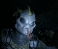 A Silurian (Doctor Who) using its venom tongue