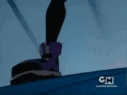 Beast Boy (Teen Titans) imprisoning Control Freak in a dimensional panel by chanting Hah Jun Kang.