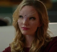 Starhavenites (Arrowverse/Supergirl) like Lyra Strayd are unseen through pictures or security camera footage.