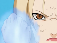 Tsunade (Naruto) ifuses her fist with chakra energy