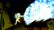 Ultimate Swampfire (Ben 10) unleashes a massive blast of blue flames.