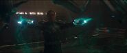 Yon-Rogg (Marvel Cinematic Universe) cab manipulate gravity in a way akin to telekinesis with his Magnitron Gauntlets which are ignited in his suit. The energy gives off a bluish green color that highlights the gravitational fields that it is currently affecting.