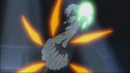 Allen Walker (D.Gray-man) using Cross Paling, which morphs his arm into an energy cannon.