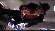 Freddy Krueger (A Nightmare on Elm Street/Wes Craven's New Nightmare) sticking to the wall of a hospital room.