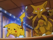 Kadabra (Pokémon) using Psychic on Pikachu.