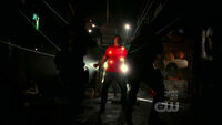 Clark Kent (Smallville) being blasted and neutralized by Kryptonite tasers.