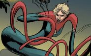 Carol Danvers/Captain Marvel (Earth-85826) (Marvel Comics) has an malleability in this universe, that meang her to stretch and contort her body unknown limits. She used her elasticity to wrap around Venom.