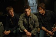 ...the current descendants, Dean Winchester (center), Sam Winchester (left), and Adam Milligan (right).