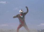 Ultraman Gaia Supreme Version (Ultraman) firing Photon Stream.