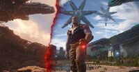 Thanos (Marvel Cinematic Universe) alters the reality around Titan using the Reality Stone.