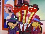 King Koopa's henchmen (The Super Mario Bros. Super Show!) all wearing Unzappable Hats, which render the wearer invulnerable.