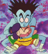 Fangs the Vampire (Dragon Ball) drains Krillin of his blood.