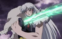 Sesshomaru (InuYasha) holds Bakusaiga with his newly regenerated left arm.