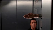 Billy Miles (The X-Files) cuts through an elevator door with his bare hand.