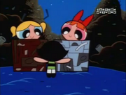 Buttercup apologizes to her (still trapped) sisters and hugs them after saving them from The Gangreen Gang's plot to kill them.