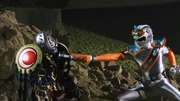 Galza fighting  his nephew Takamichi.