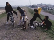 Isamu is near falling when he rides