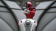 Female Red Ranger in her cockpit