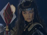 Long black hair (ep. 3 - 5. Also used as disguise in Lost Galaxy 32)