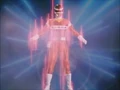 A full-body shot of a Megaranger's civilian form sees the transforming Megaranger bring their arms downwards before the Mega Suit appears through laser lines followed by the Mega Suit spinning 360° after materialization for a full-view body display.